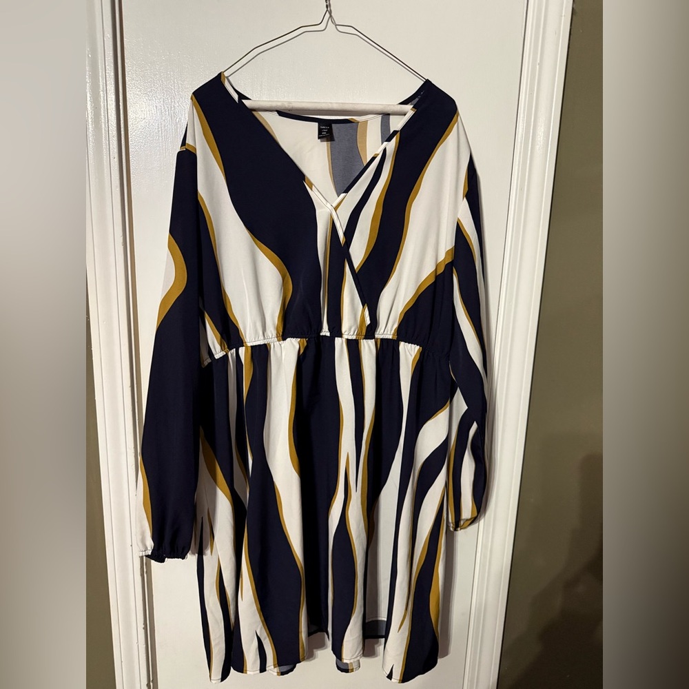 Women’s sling sleeve knee length gold and blue striped dress. Size 3X